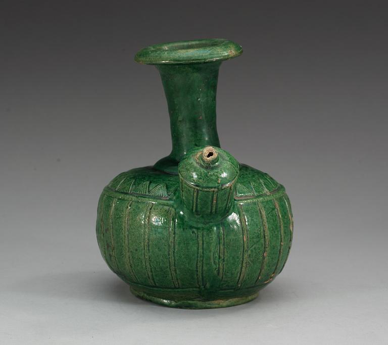 A green glazed kendi, Ming dynasty.