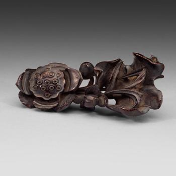 570. A finely carved Zitan "Lotus" stand, Qing Dynasty (1644-1912).