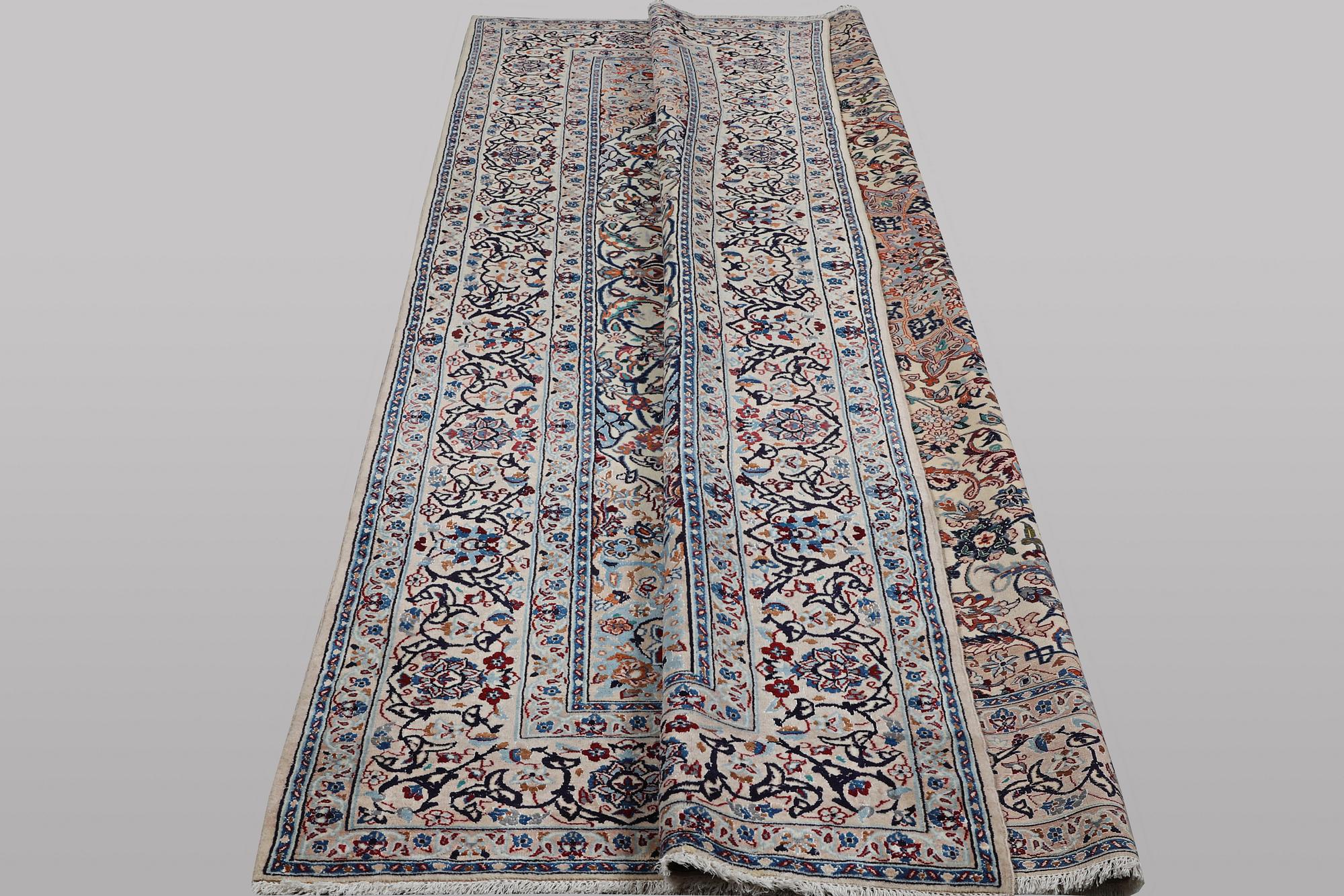 A carpet, Nain, part silk, 9 laa, ca 344 x 213 cm.