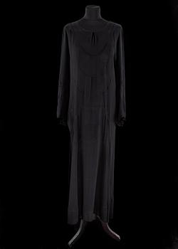 718. A 1910s/20s black evening dress.