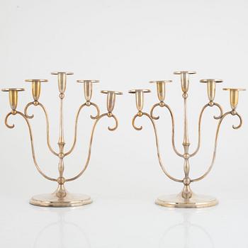 A pair of silver plated candelabra, mark of CG Hallberg, Stockholm.