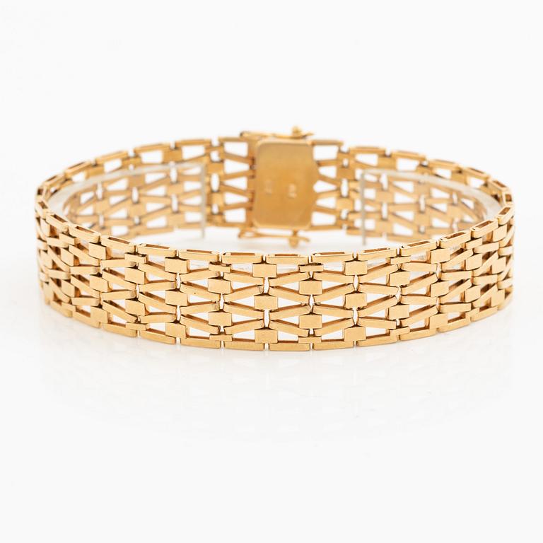 Arm bracelet, 18K gold.
