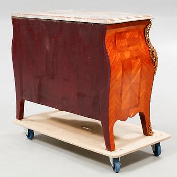 A rococo style chest of drawers, around the mid 20th century.