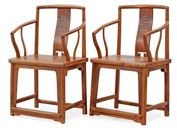 1305. A pair of hardwood armchairs, Qing dynasty.