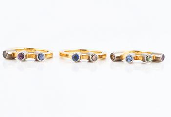 Three multicolored sapphire and brilliant cut diamond rings.