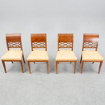 A set of four empire style mahogany chairs, first half of the 20th Century.