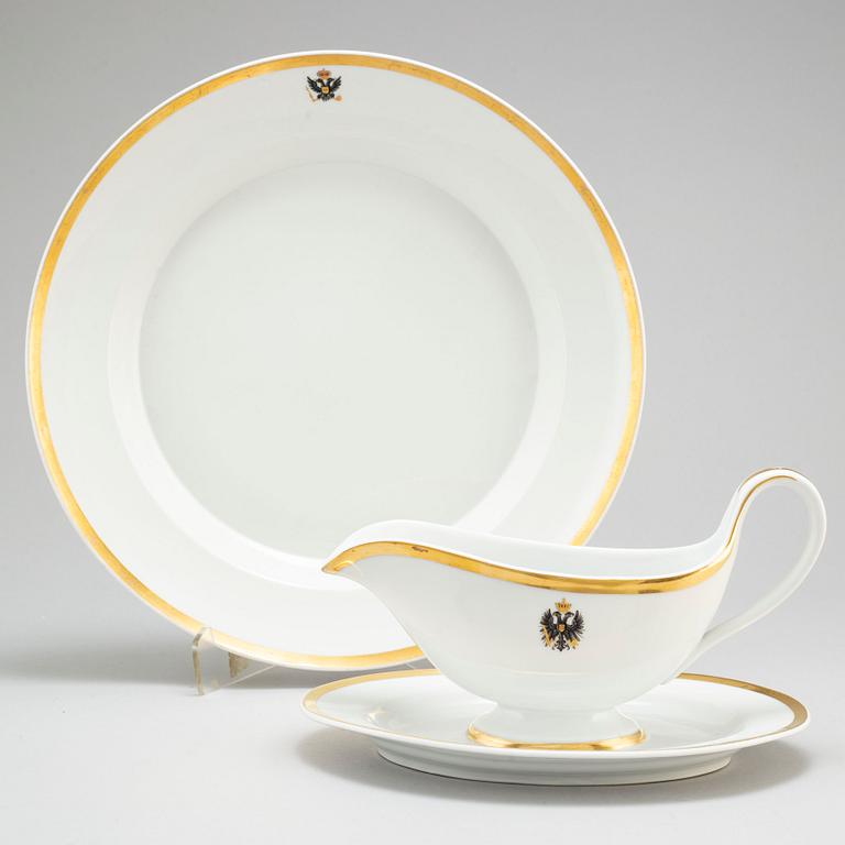 A first half of the 19th century porcelain plate and sauce boat, KPM, Berlin, Germany.