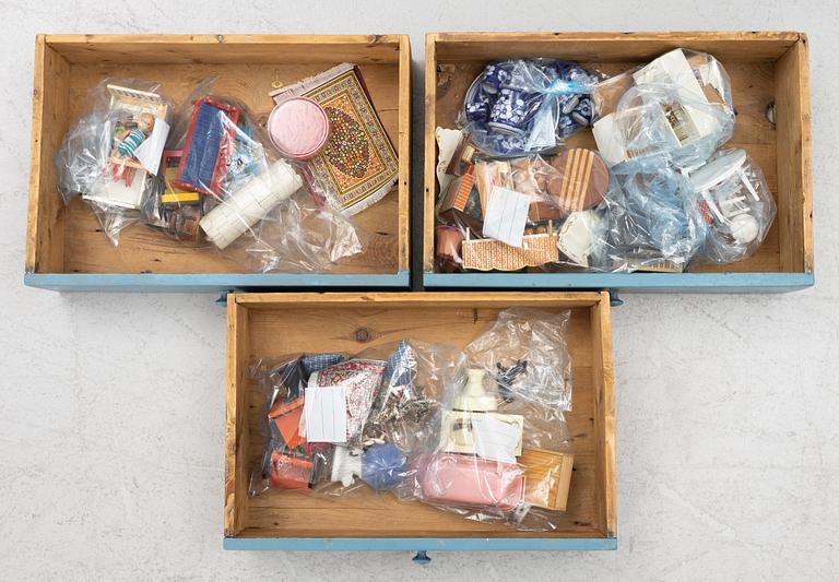 Doll's house with accessories, from around the mid-20th century.