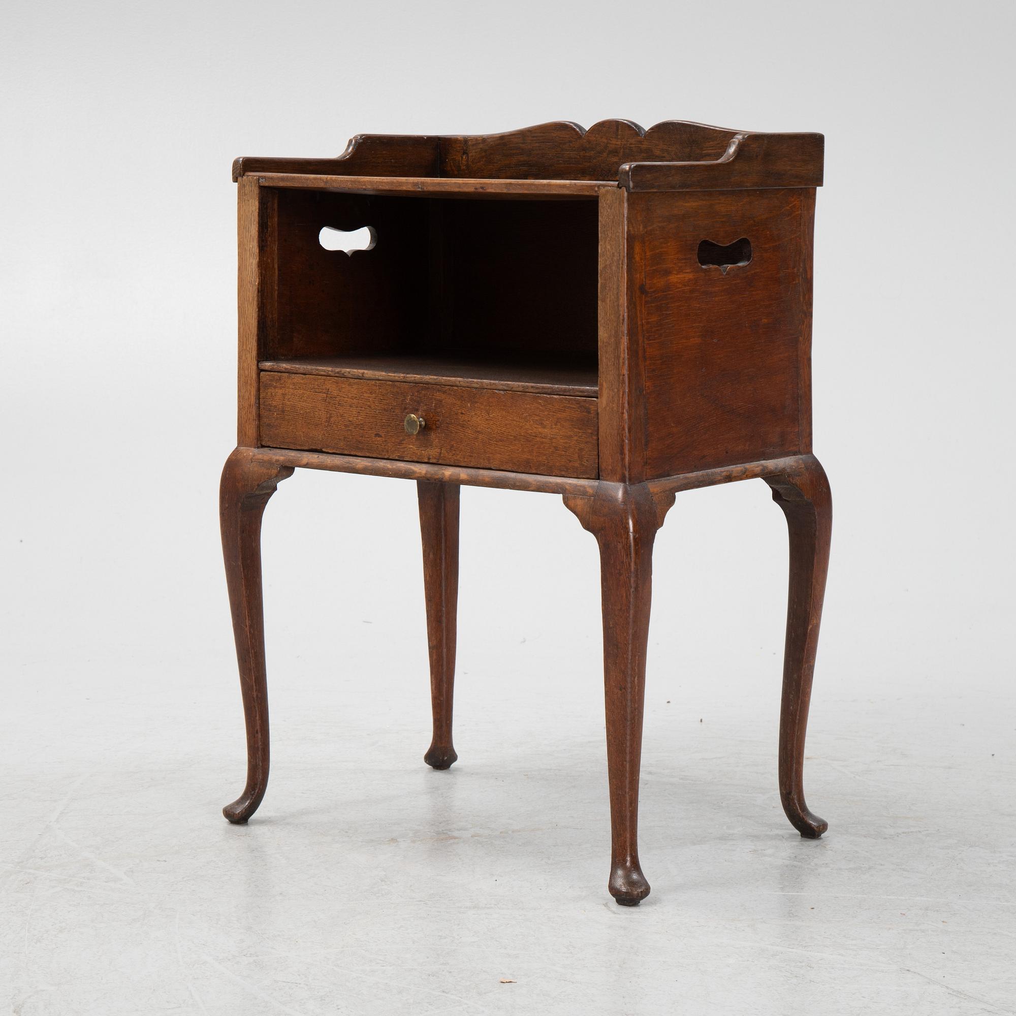 A rococo style bedside table, early 20th Century.