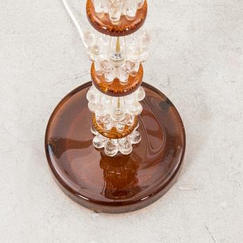 A 1970s glass floor lamp.