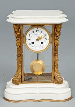 103. A MANTELPIECE CLOCK.