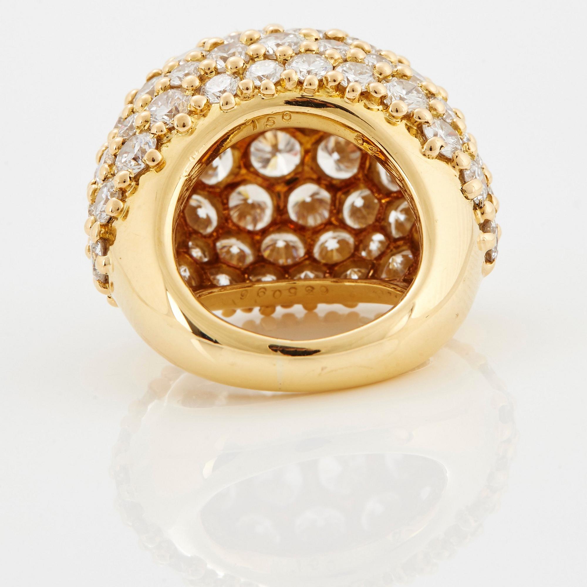Cartier "Marrakech" an 18K gold bombé ring set with round brilliant-cut diamonds.