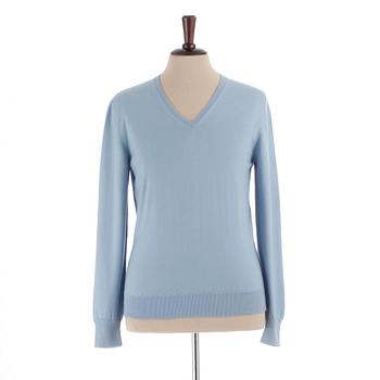 YVES SAINT LAURENT, a men's blue wool sweater, size M.