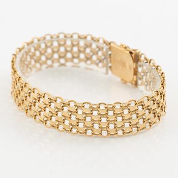 Arm bracelet, 18K gold, x-link.