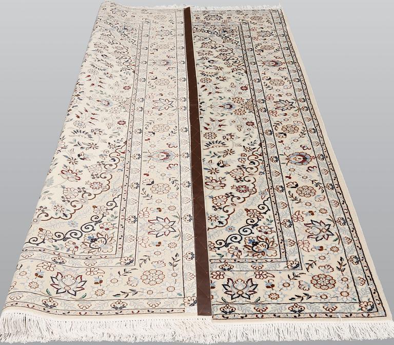 A part silk, Nain carpet, so called 9 LAA, ca 243 x 168 cm.