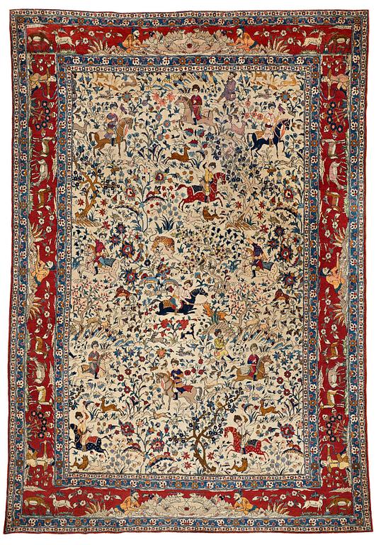 A CARPET, a semi-antique Teheran probably, a figural part silk, ca 347,5-345,5 x 242 cm.