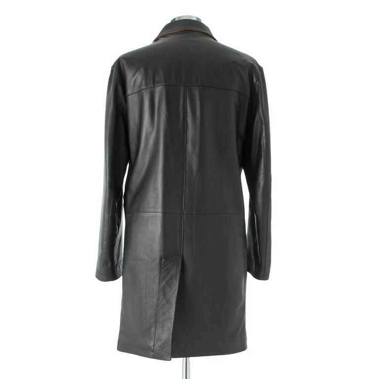 BURBERRY, a black leather overcoat.