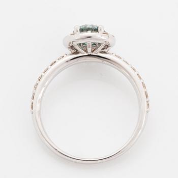 Ring, med briljantslipad blå färgbehandlad diamant.