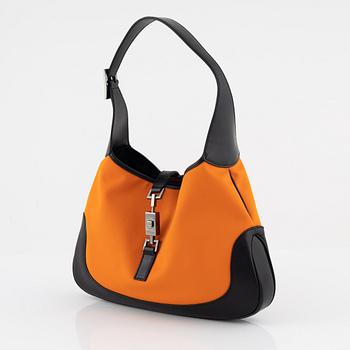 Gucci, a vanvas and leather 'Jackie' handbag.