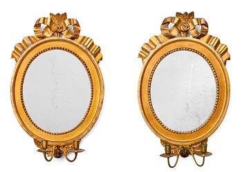 A PAIR OF TWO-CANDLE MIRRORS.