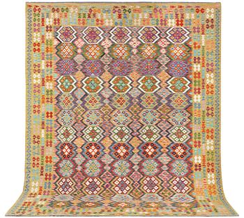 A Kilim carpet, c. 387 x 310 cm.