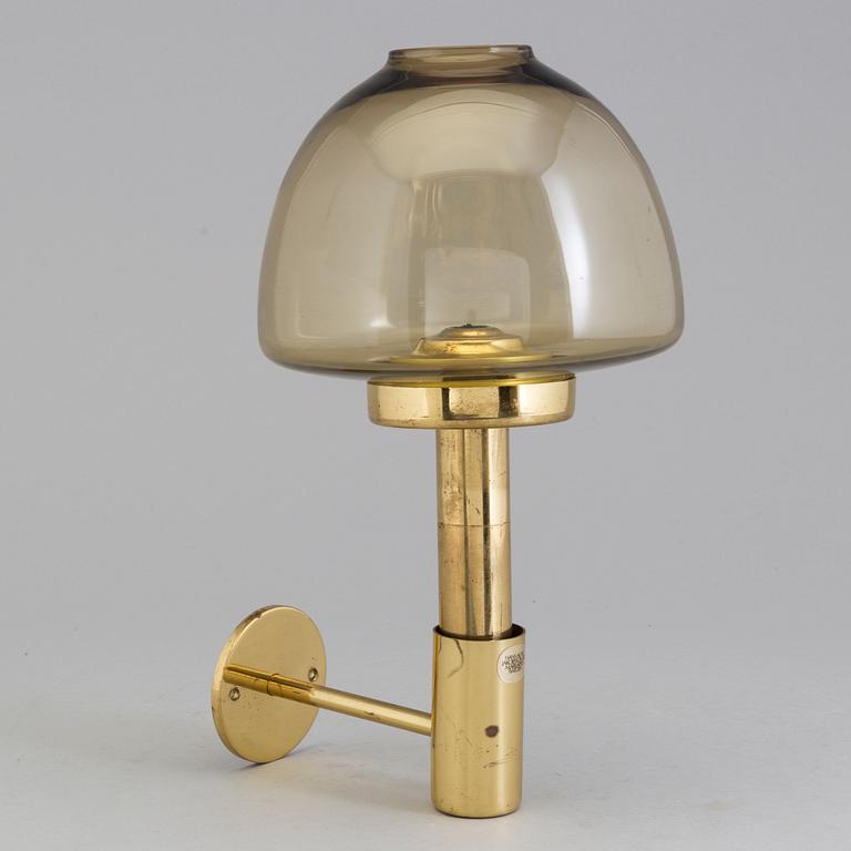 HANS AGNE JAKOBSSON, VÄGGLYCKTA, mässing, Markaryd, 1900-talets andra hälft.