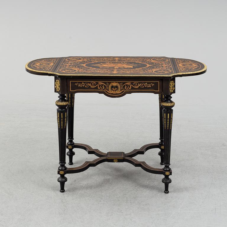 A Louis XVI-style table from the first half of the 20th century.