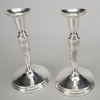 A pair of silver candlesticks by Meya Lerible for Mema, Linköping 1994.