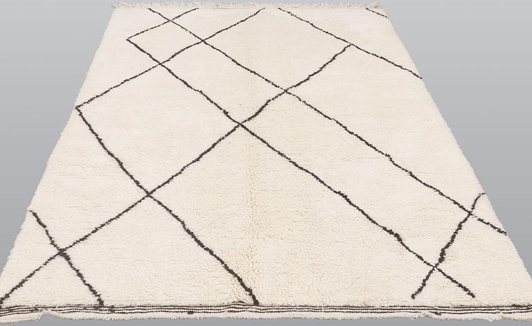 A Maroccan rug, ca 254 x 160 cm.