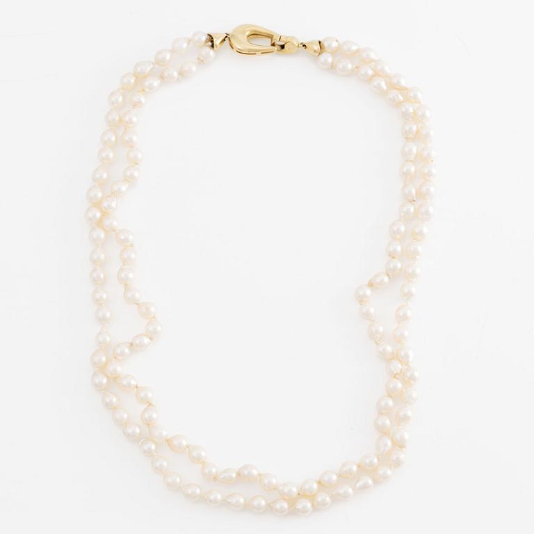 Necklace two rows of cultured pearls clasp 18K gold.