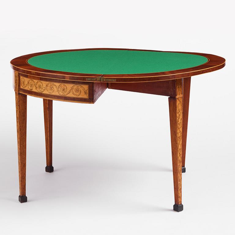 A Russian Louis XVI mahogany and birch parquetry demi-lune games table, late 18th century.