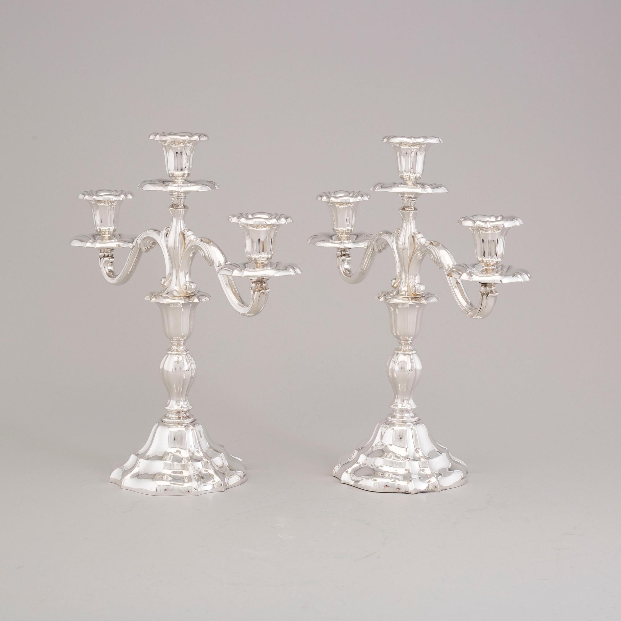A Pair of silver candelabras by JG Hentzell 1931.