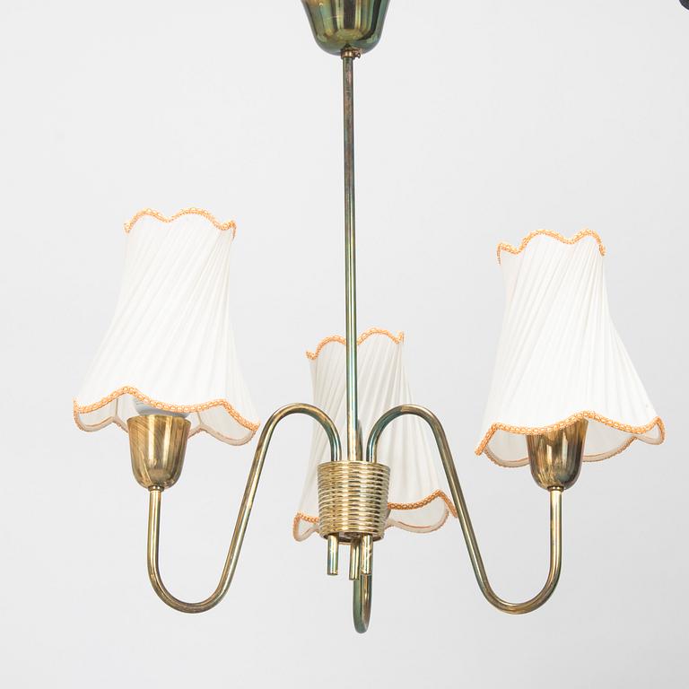 A mid-20th century ceiling light by Valinte.
