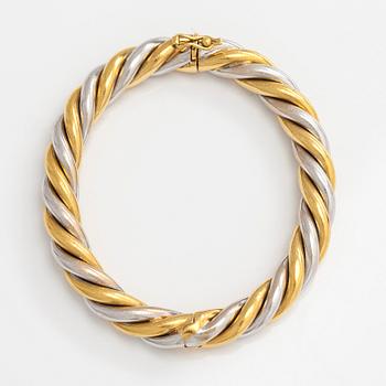 An 18K gold/white gold bracelet, Switzerland.