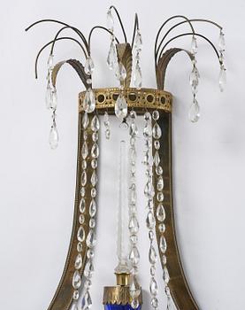 A pair of Russian Louis XVI-style  four-branch gilt bronze appliques, 19th century.