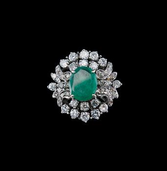 560. A RING, 8/8 and 16/16 cut diamonds c. 1.50 ct. Emerald c. 2.69 ct. Weight 10 g. Gemmological certificate.