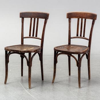 A matched set of four wooden chairs, first half of 20th Century.