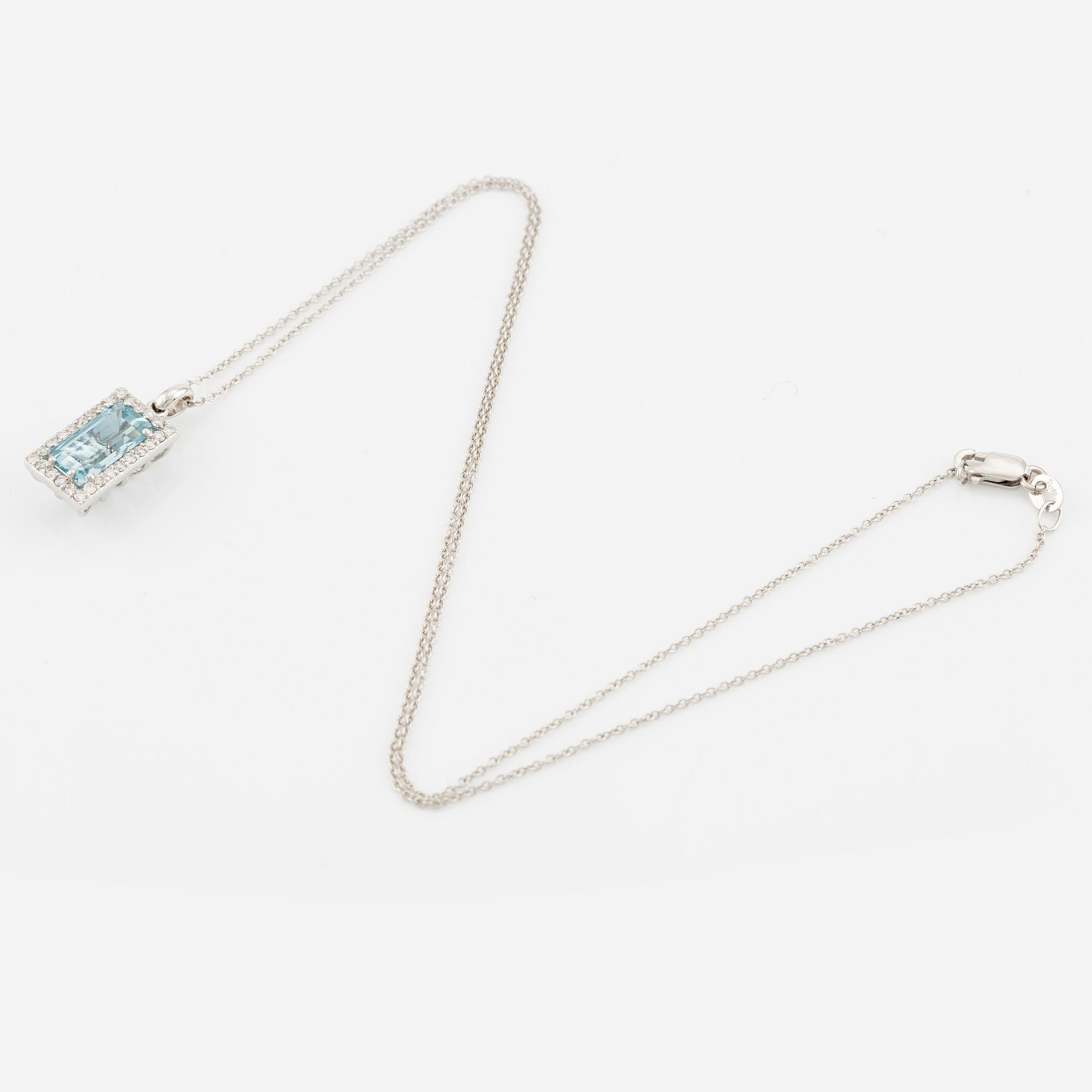 Pendant with chain in 18K gold set with a faceted aquamarine and round brilliant-cut diamonds.