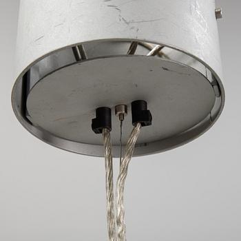 A 'Fil de Fer Ovale' ceiling light by Enzo Cattelini.