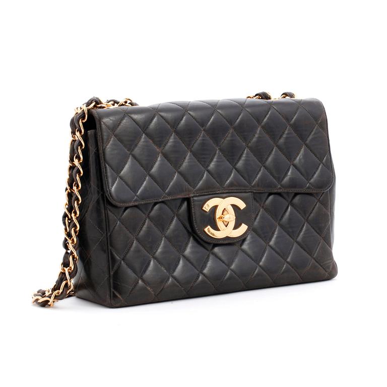 CHANEL, a quilted black leather shoulder bag, "Flap bag".