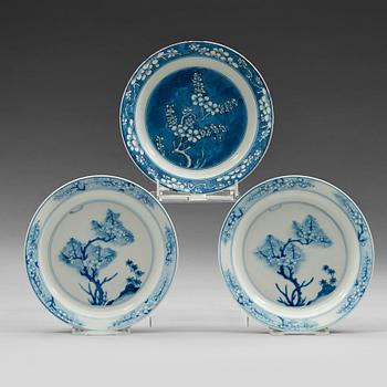 Three blue and white dishes, Ming dynasty, 17th Century with Jiajing six character mark.