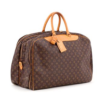 272. LOUIS VUITTON, a Monogram canvas weekend bag / garment cover bag, "Alizé".