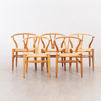 Hans J Wegner, five CH 24 chairs  Carl Hansen & Son, Odense, Denmark.
