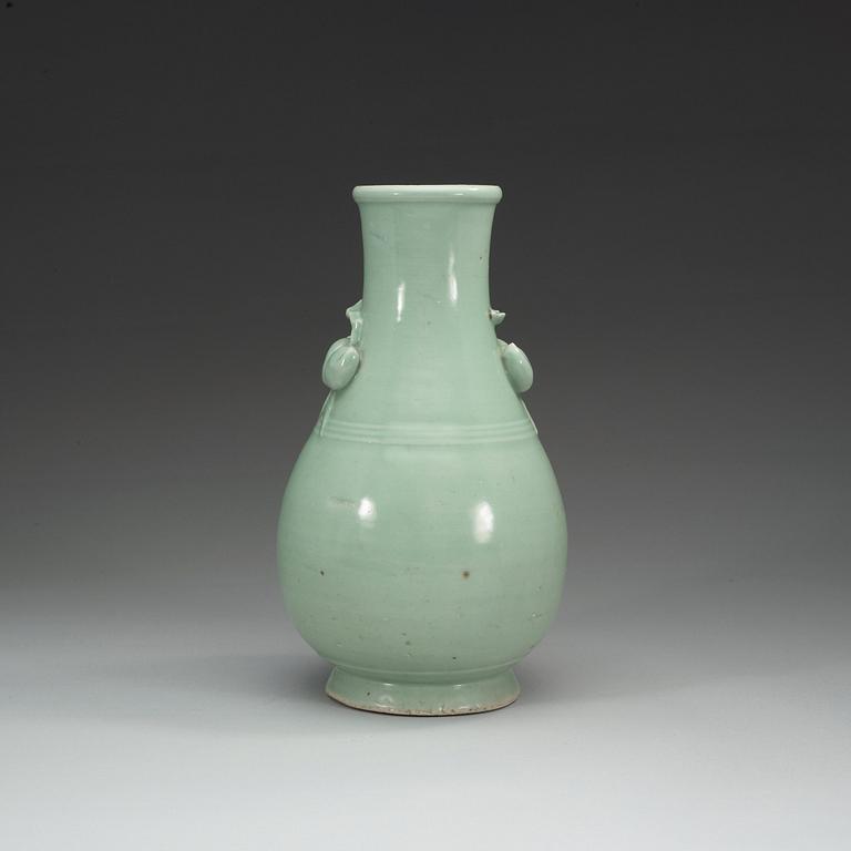 A celadon glazed vase, Qing dynasty, 18th Century.