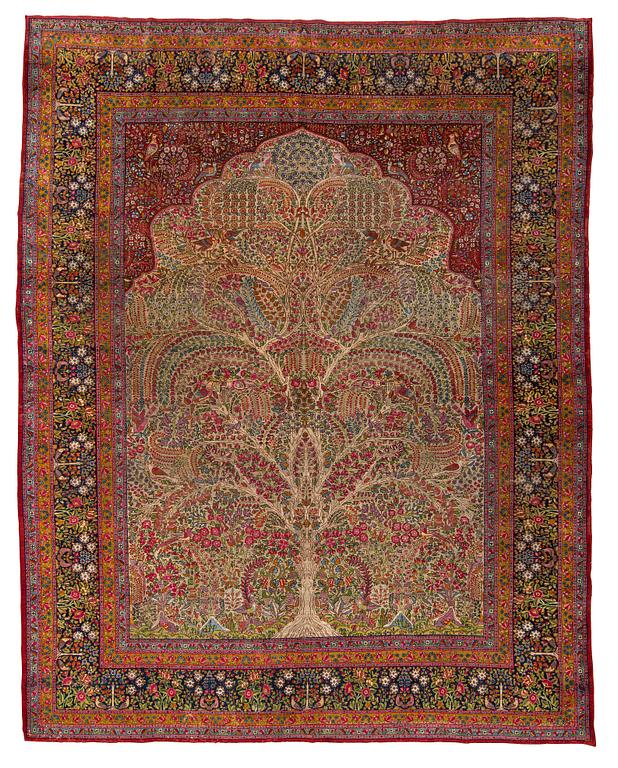 A CARPET, semi-antique Kerman, ca 360 x 284 cm.