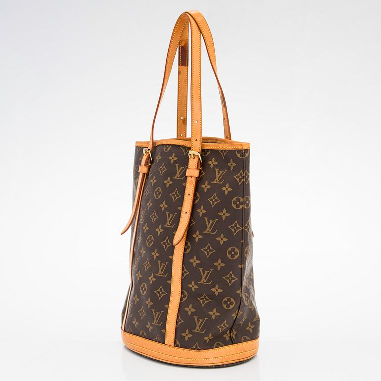 Louis Vuitton, a Monogram Canvas "Bucket" bag and pochette.