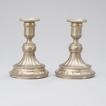 A pair of Gustavian pewter candlesticks dated 1785.