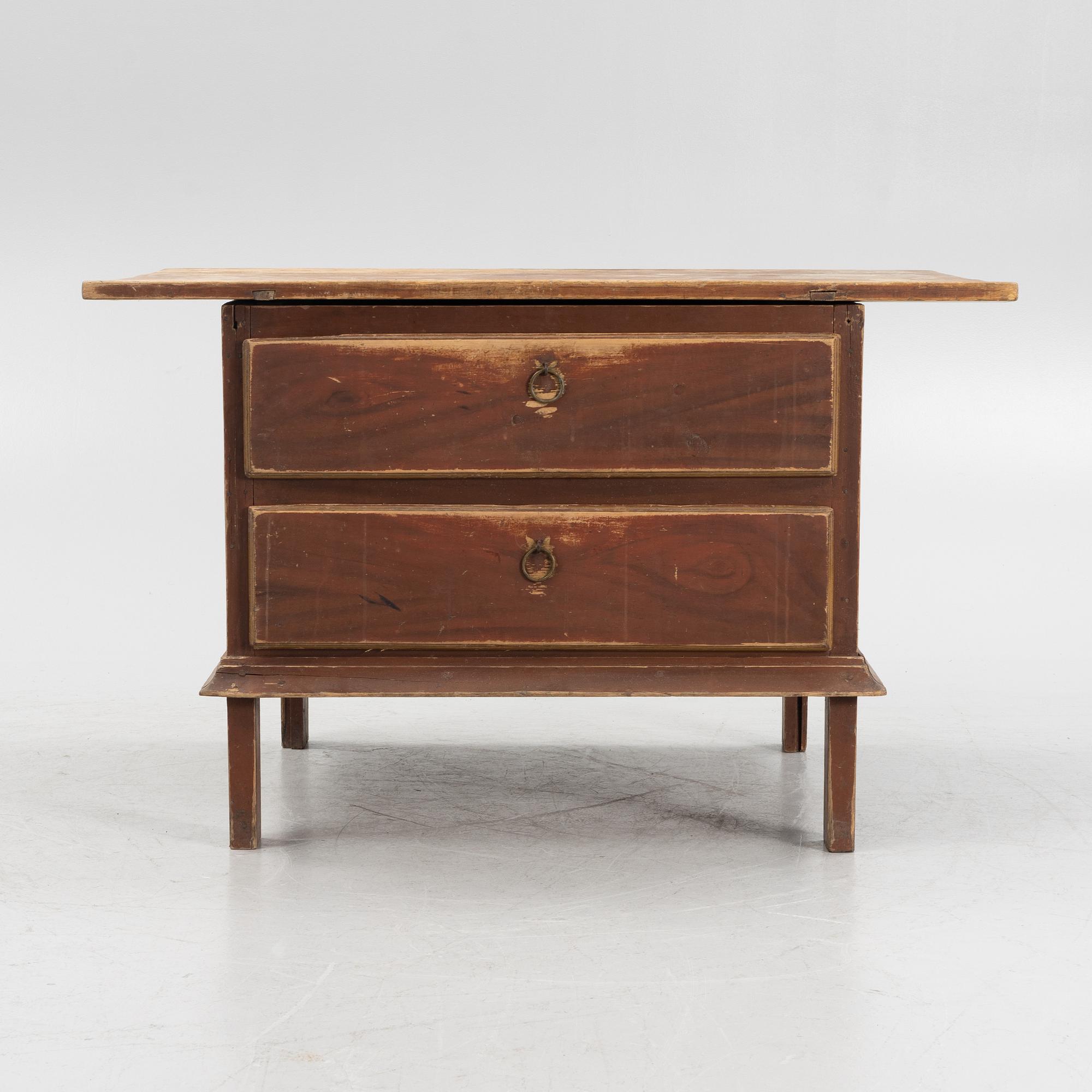A painted table with drawers, 19th Century.