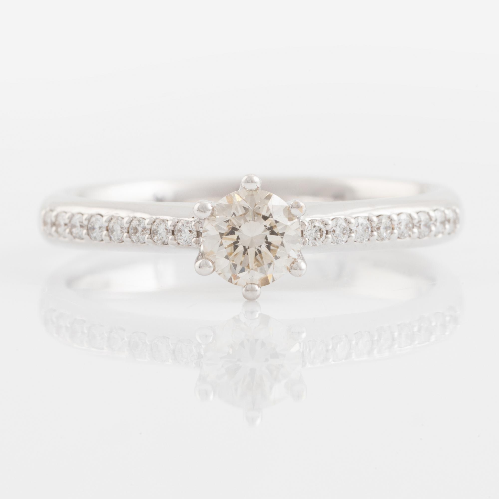 Brilliant cut diamond solitaire ring, with IGI report.