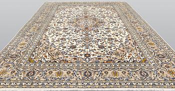A Keshan carpet, approx. 390 x 295 cm.